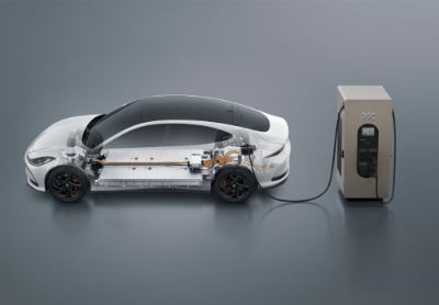 Transparent im5 charging at a station, showing internal components.